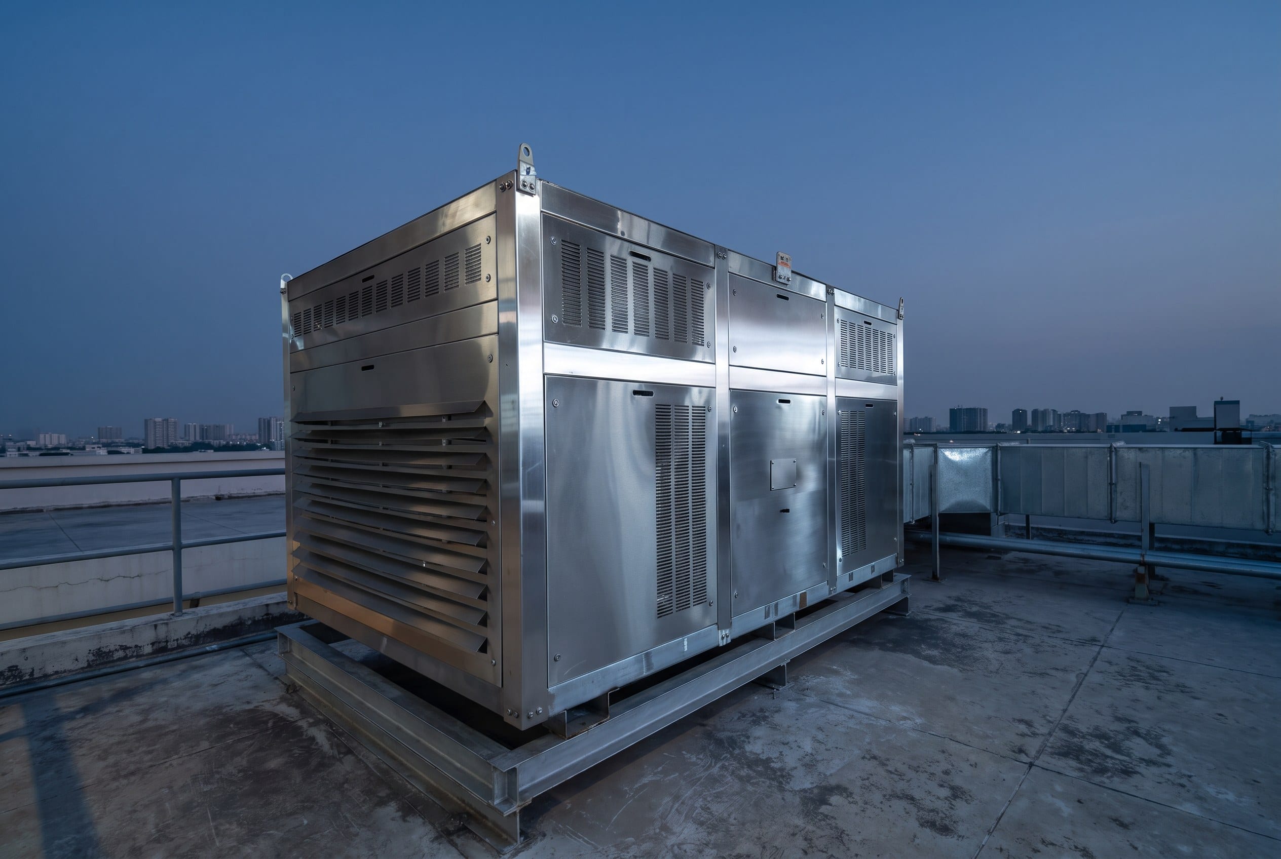A Signature series unit on the service roof of a commercial building at blue hour